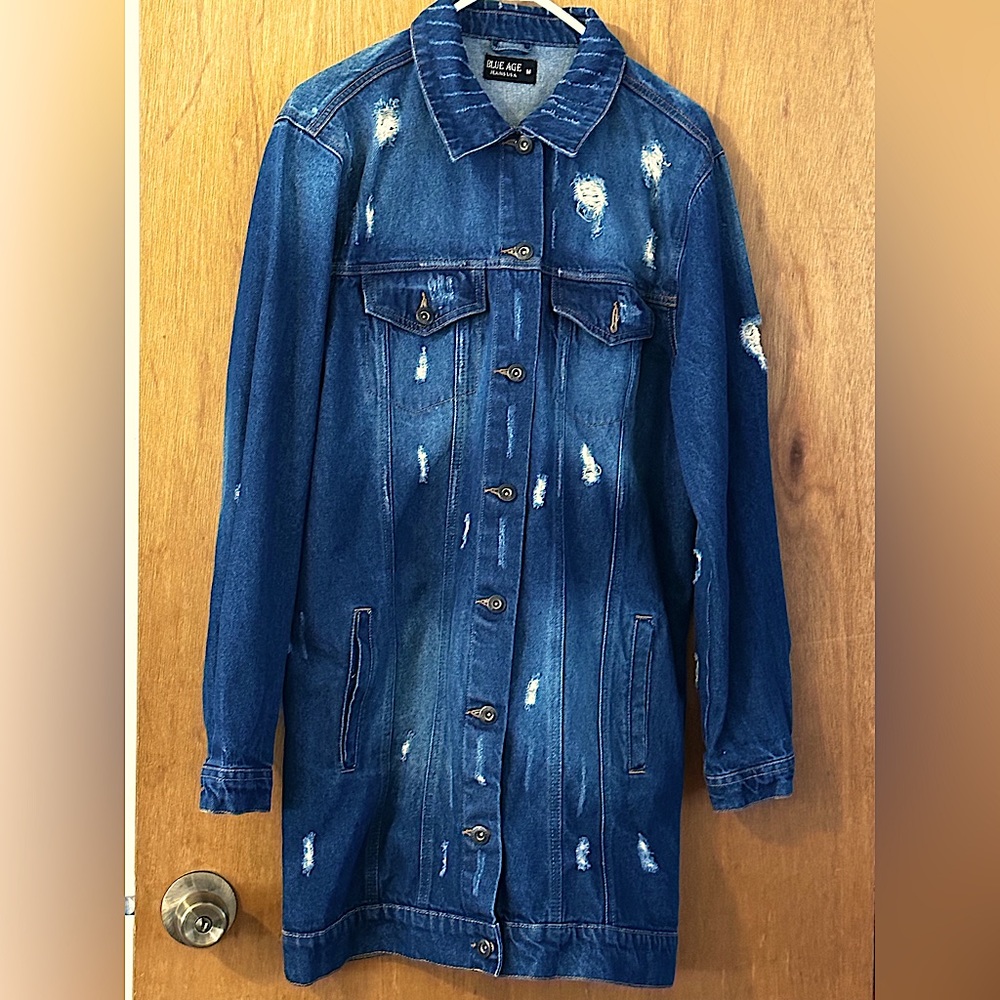Long denim dark blue jacket only worn once practically brand new good condition